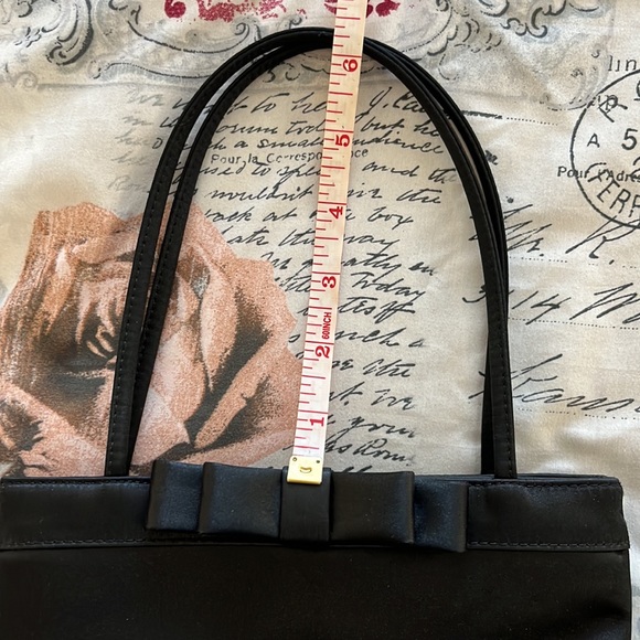 Black satin bow dressy purse with zipper inside. Very lightly used. - Picture 6 of 9